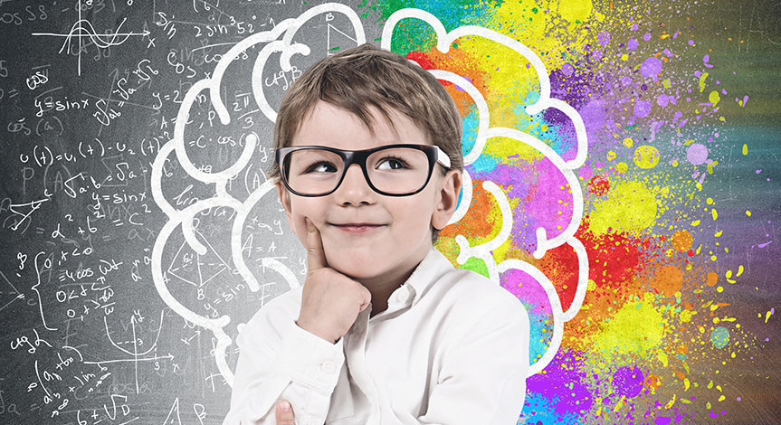 Little boy in glasses deep in thought, brain sketch, formulas and colorful patches in the background